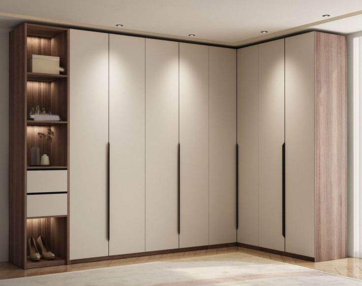 Modern L-shaped wardrobe design with beige matte finish, wooden textures, open shelving, and sleek black handles in a minimalist bedroom interior